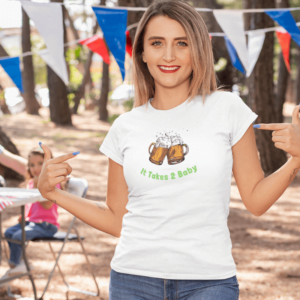 A woman wearing "It Takes 2 Baby" on a t-shirt